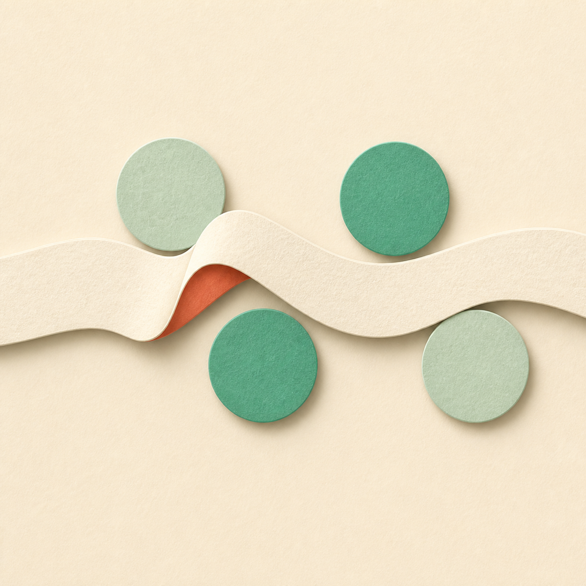Cream paper ribbon weaving past four green felt circles on a warm sand background, with a coral fold beneath the wave — abstract paper-cut composition