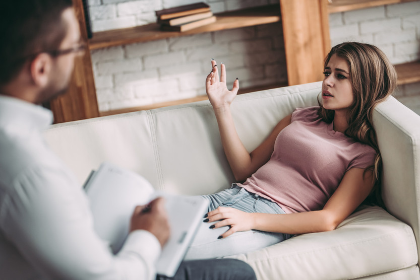 Woman talking with her therapist during an individual adult counseling session